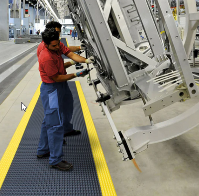 On Your Feet: How Anti-Fatigue Mats Improve Employee Health and Productivity