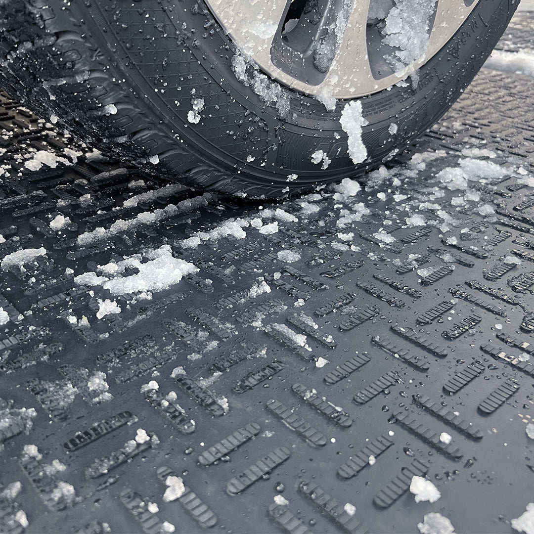 winter driveway cleared using snowmelt mat system